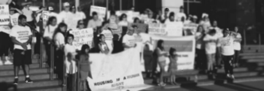 a group of people organizing on the steps for housing