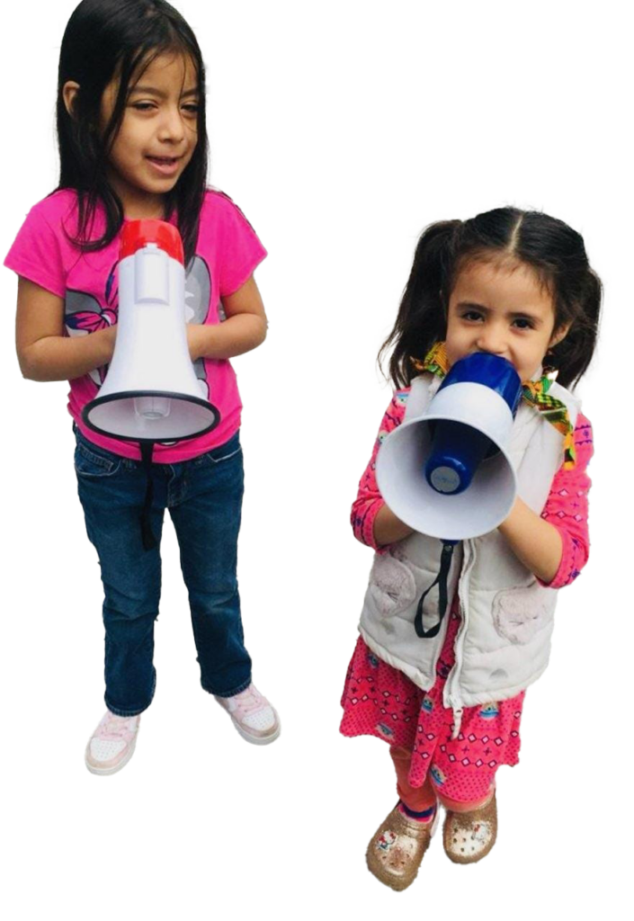 two young girls holding megaphones